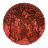 Plate cinnabar lacquer, China. 20th century. Decorated in relief with scene of Tao in the act of