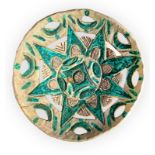 Plate terracotta wall, Italian production. Decorated in shades of teal, casual decor on the brim.
