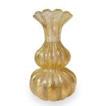 Barovier and toso, glass vase. Shape globular inclusions with gold leaf, ribbing along the surface.