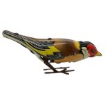 Toy tin, little bird. Length 12 cm.