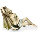 Earthenware sculpture depicting a naked woman with conch, Creating Rome. H 22x37 cm.
