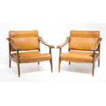 Pair of armchairs, wooden frame, seat and backrests in the sky, brass inserts. Years 60. H 72x69x72