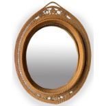 Mirror in woven wicker, Italian production. Years 60. H. 51 cm L. 30 cm. Minimum failures, Wear