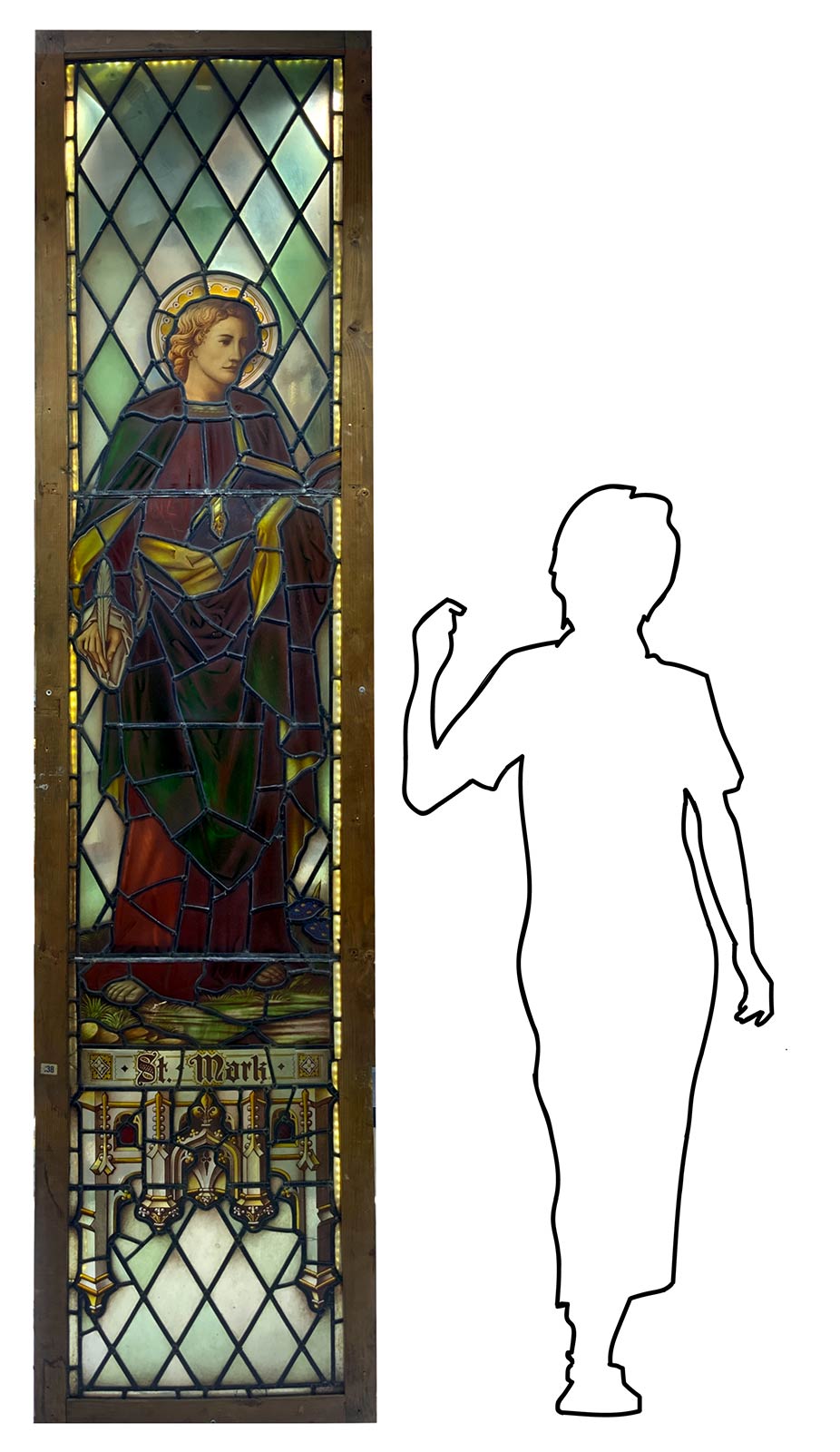 Ancient glass bound to lead with infusion in glass images depicting St Mark, the Evangelist. In