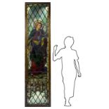 Ancient glass bound to lead with infusion in glass images depicting St Mark, the Evangelist. In
