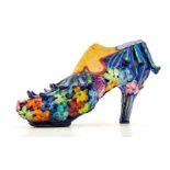 Sculpture shoe-shaped elegantly decorated with colorful materials and various resins, Laura