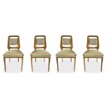 Group of four chairs, light wood structure, padded backrest, covered with beige-colored sky,