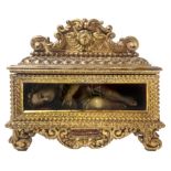 Child in wax with the Sacred Heart in the chest, within rich casket in gilded wood of the