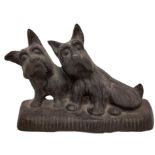 Pair of iron dogs, door stops, 20th century. H cm 15x22.60s