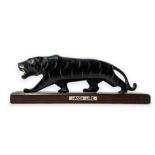 Sculpture of Tiger Hansa "Hansa Linie" with wooden base, 20th century. 4x16 cm.