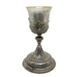 Silver Chalice chiseled and embossed with cherubs. Punch at the base and essay Console. 18th