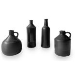 Bucci, n.4 bottles group earthenware decorated in shades of gray metal. Years 70. H max 25 cm diam.