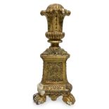 Base gilded wooden candlestick with leonine feet, eighteenth century. H 50 cm
