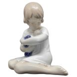 Figurine depicting little girl sitting with doll, Manufactory Royal Copenhagen. Denmark