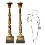 Pair of candlesticks made of lacquered wood, faux finish porphyry and gilded with acanthus leaves.