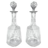 Pair of crystal bottles. 20th century. H 28 cm, h 30 cm