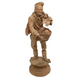 Sculpture in terracotta representing monochrome old man with bread basket, Bottega Vaccaro,