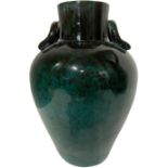 Italian production attributed to Zaccagnini. Ceramic vase-shaped high collar and small banister