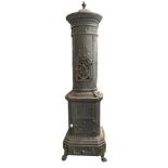 Cast iron stove, the nineteenth century. With a square base with leonine feet hurled with