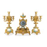 Triptych consisting of watch and pair of candlesticks to 5 lights with porcelain inserts in the