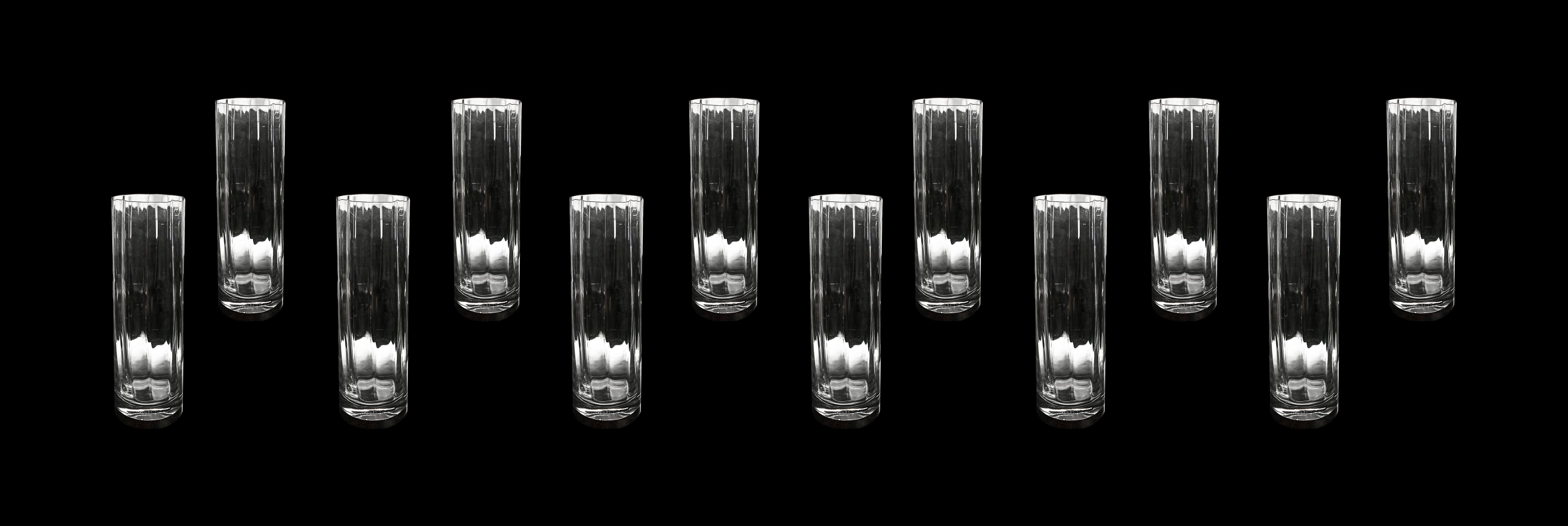 set of glasses for 12 people multifaceted crystal cylindrical shape with a silver base. Punch 60s.