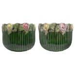 Pair of porcelain pot covers, processing slip material in green color, floral decoration along the