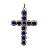 Cross in gold and silver with sapphires. Gr 15.5