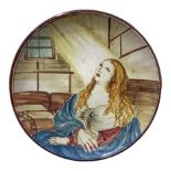 Majolica plate depicting St. Agatha in prison, hand painted. Diameter 26 cm Signed and dated