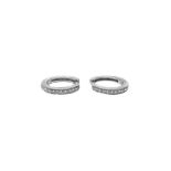 Hoop earrings in white gold with diamonds. Gr 4.7.