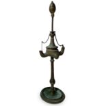 Lume to brass oil, eighteenth century. A four lights turn off with snot and clean wick. H 55 cm,