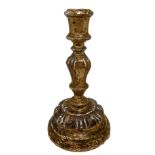 Candlestick in gilded wood. Nineteenth century. H 24 cm.