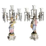 Pair of porcelain candlesticks Biscuit with three lights with brindoli bevelled glass in hand, Old