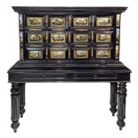 Coin Cabinet in black ebonized wooden two-body, eighteenth century. Panels 12 to the Chest of