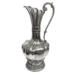 Important pitcher silver, early twentieth secolo.Con handle, lobed body and embossed. H cm 41.