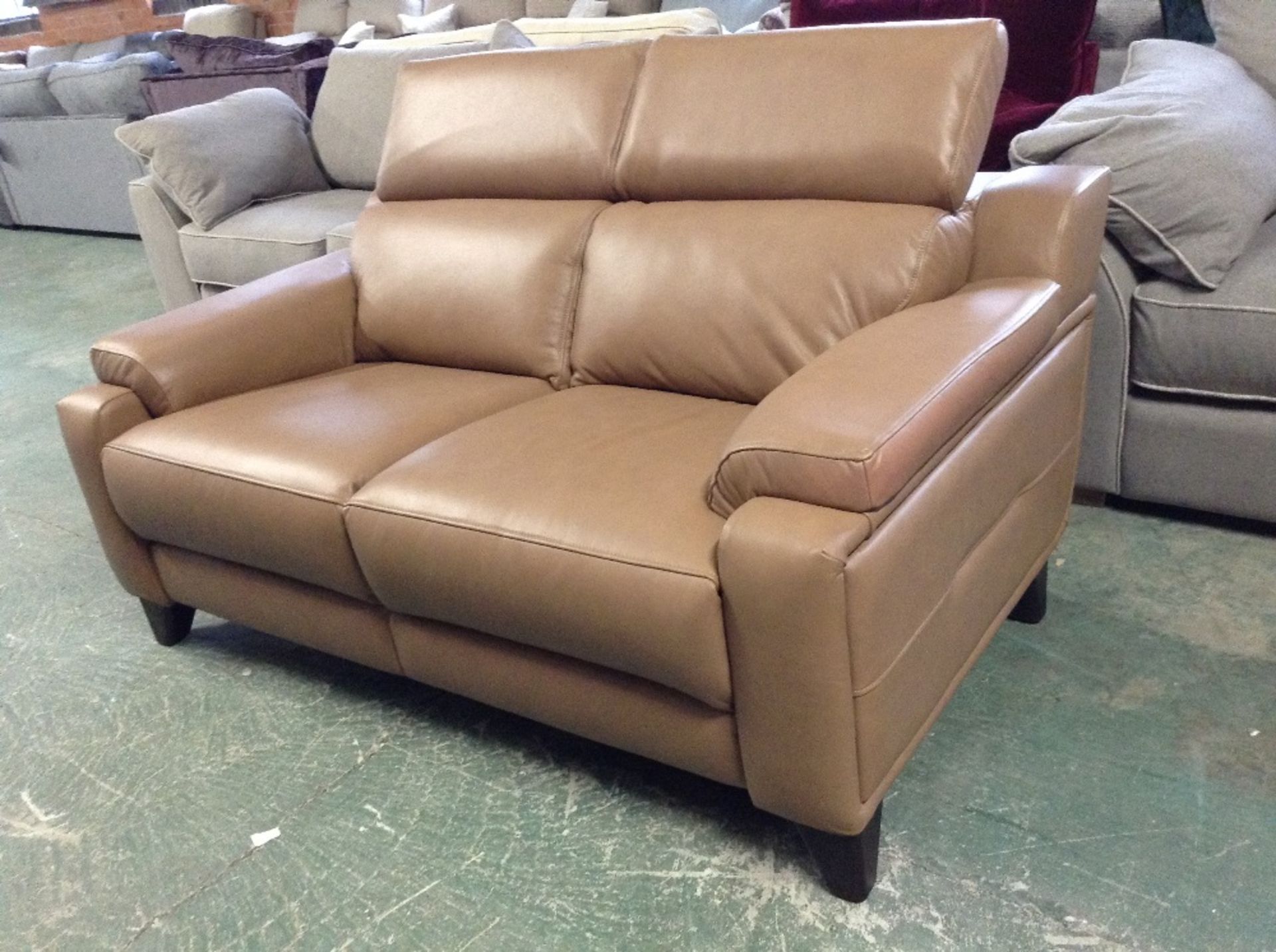 EX SHOWROOM CARAMEL LEATHER 2 SEATER SOFA WITH ADJ