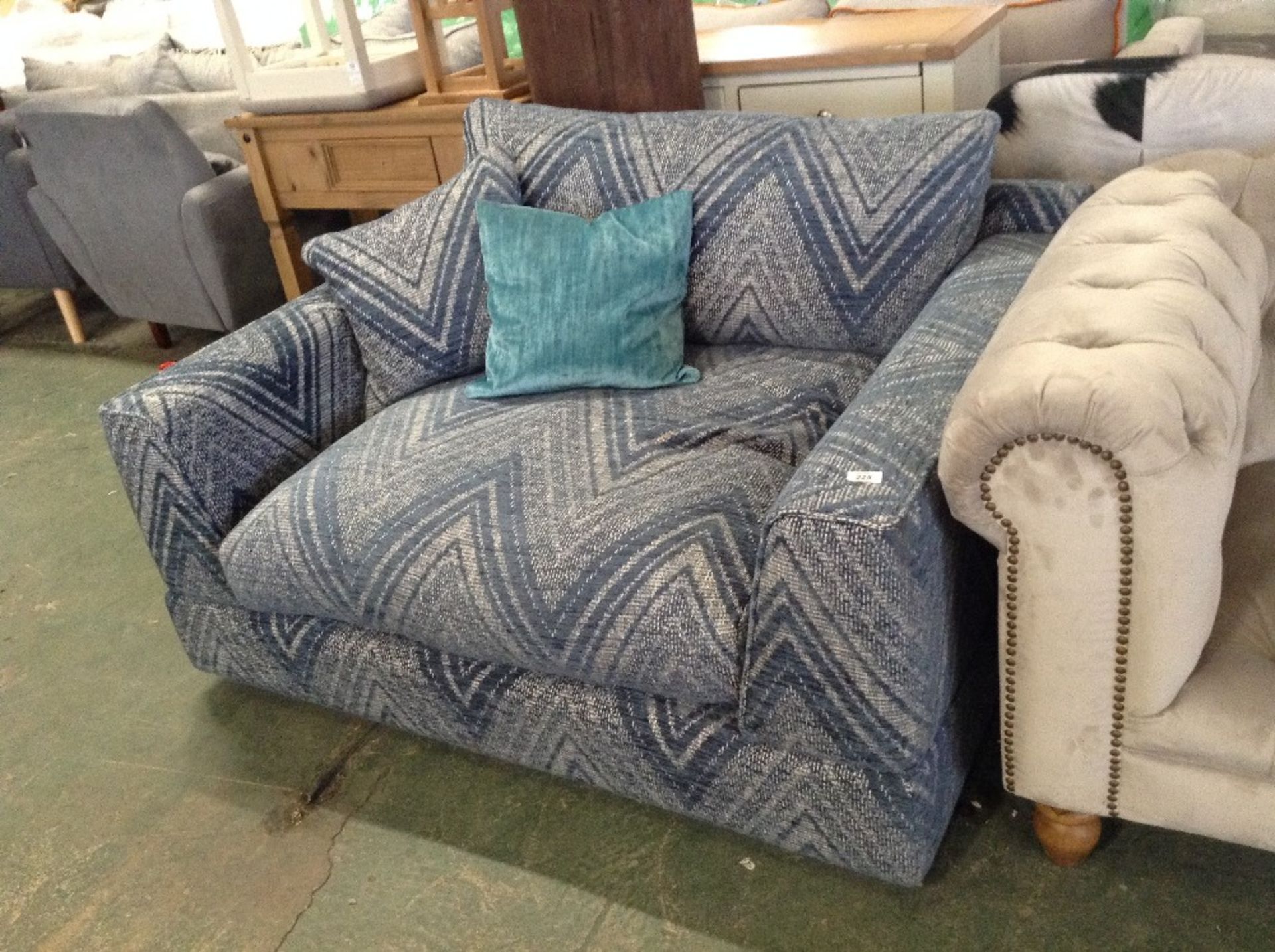 SILVER AND BLUE PATTERNED SNUG CHAIR