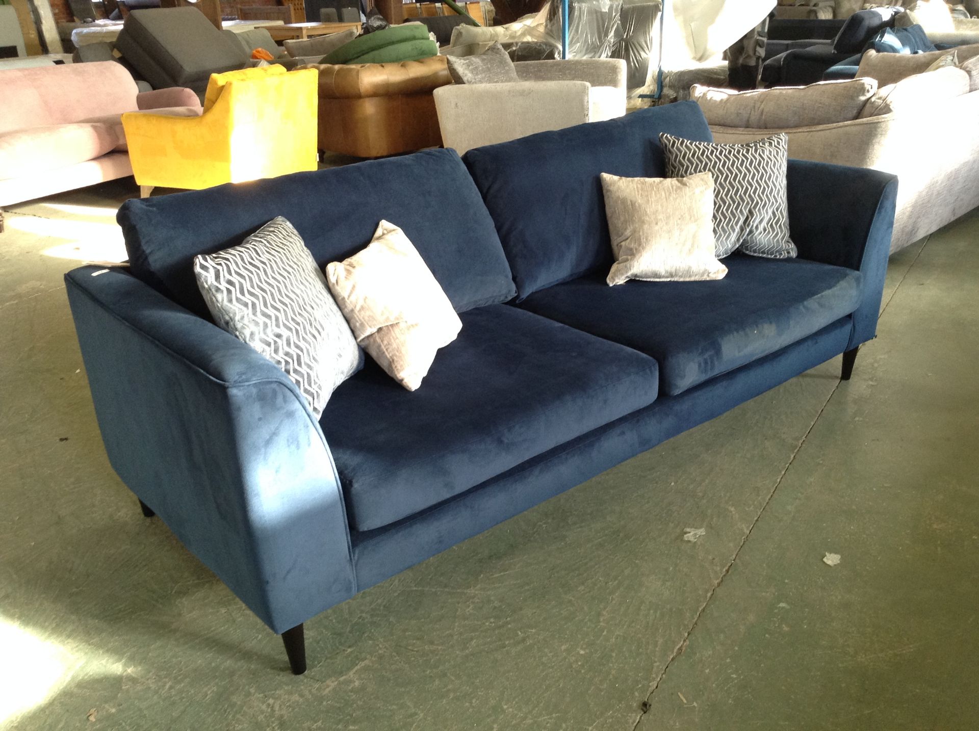 NAVY BLUE LARGE 3 SEATER SOFA (RIP ON BOTTOM CORNE