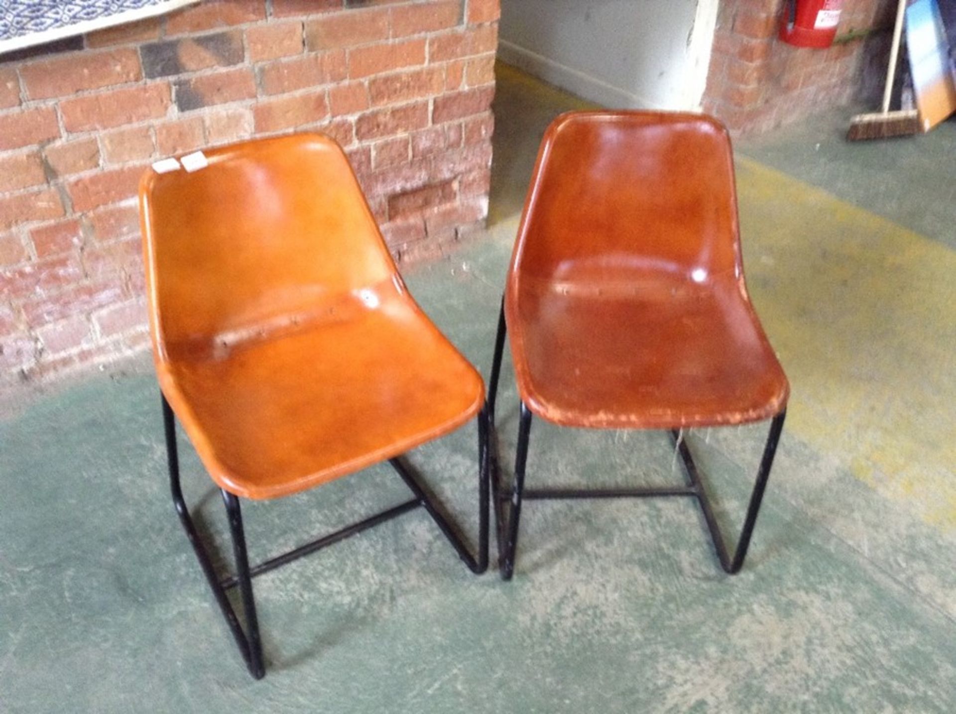 PAIR OF TAN LEATHER CHAIRS (MARKED) (28)(RETURN)