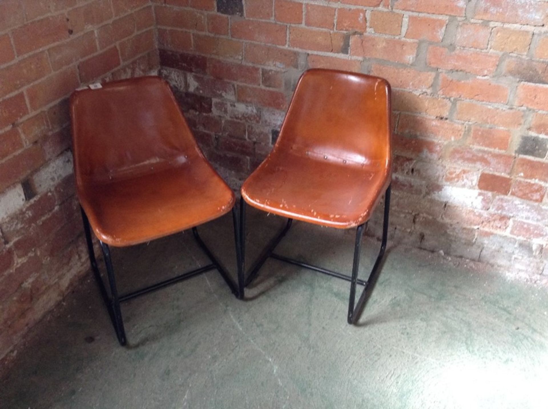 PAIR OF TAN LEATHER CHAIRS (MARKED) (26)(RETURN)