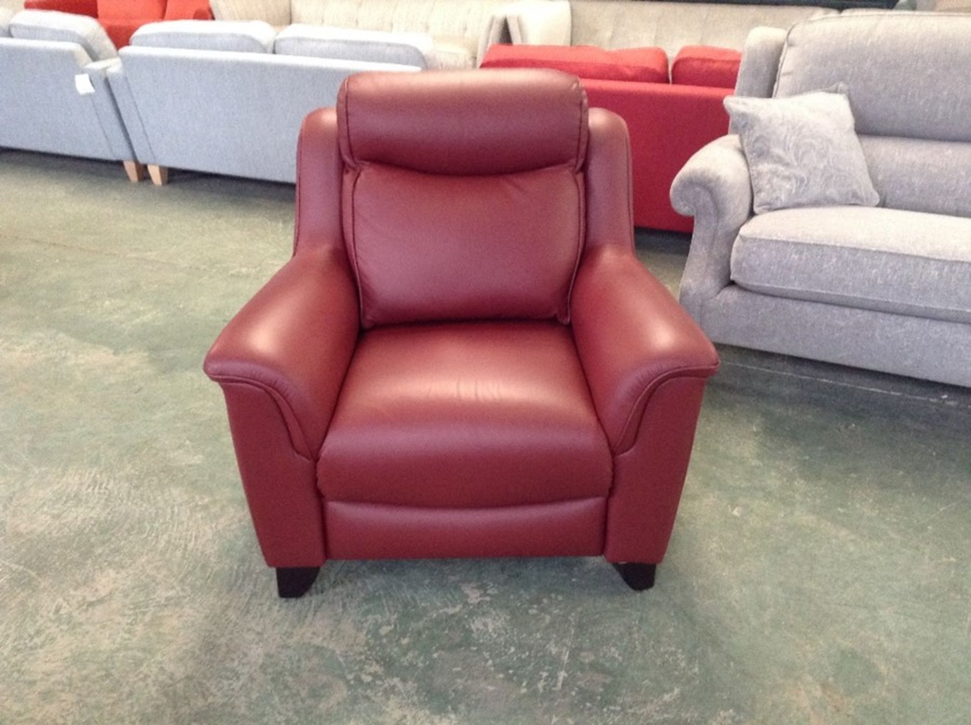 RED LEATHER CHAIR (STICHING LOOSE ON SIDE OF CHAI