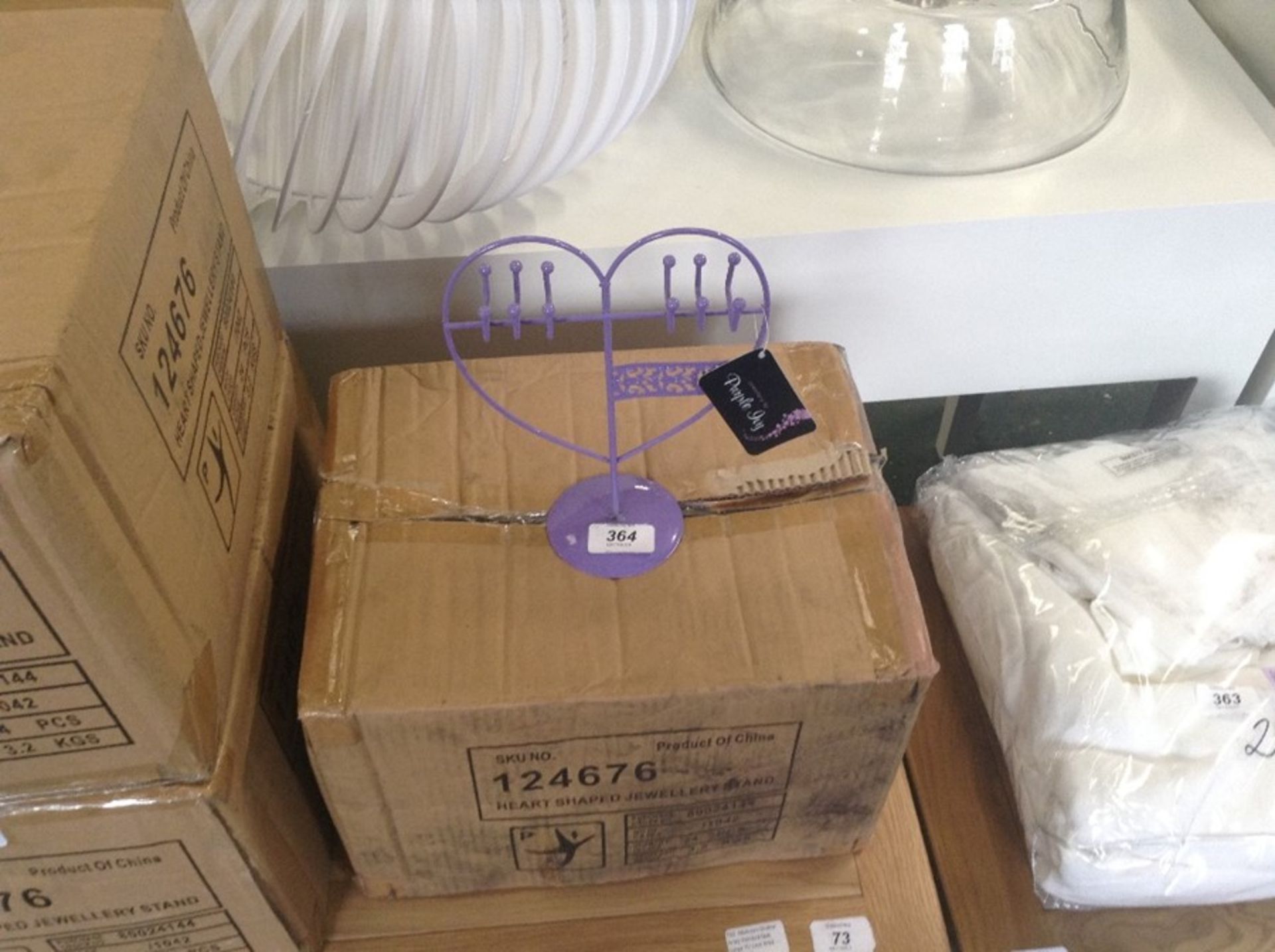 BOX OF APPROXIMATELY 24 HEAT SHAPE JEWELLERY STAND