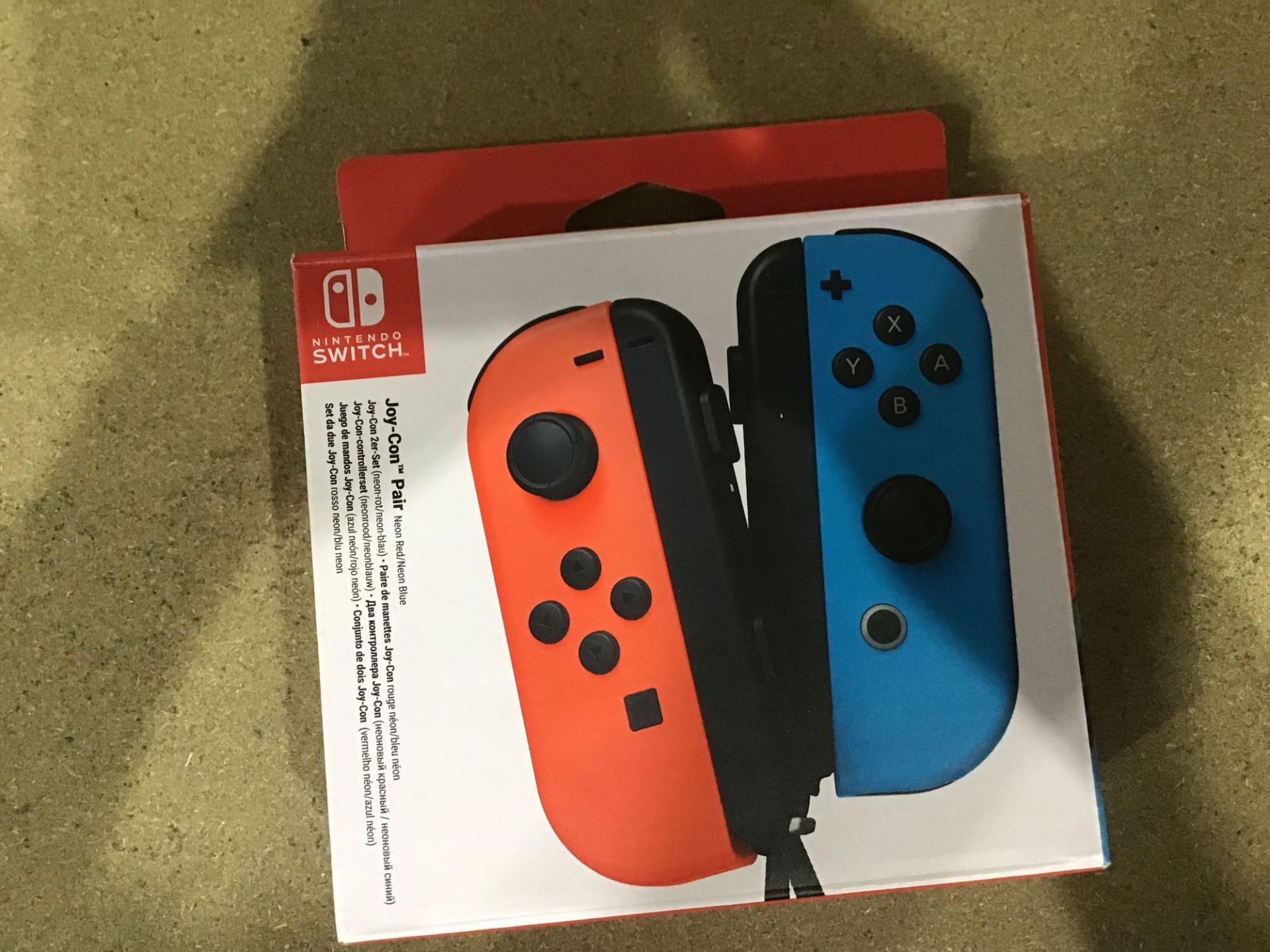 Nintendo Switch Joy-Con Controller Pair - Neon Red and Blue (678/3651) £69.99 RRP - Image 3 of 4