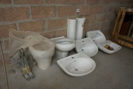 Quantity of Porcelain Kitchen Equipment Comprising; Wall Mounted Toilets, 2no. Pedestals, 3no. Sinks