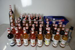 50no. Various Unopened Monin Flavoured Syrups Complete with Monin Dispensers and Monin Display