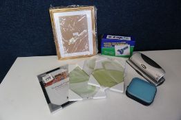 Quantity of Photo Frames, Tape Dispenser and Hole punch as Lotted