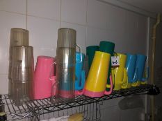 Quantity of Plastic Multi Coloured Jugs as Lotted. Collection Strictly 09:30 - 15:30 Tuesday 24