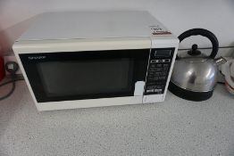 Sharp Domestic Microwave and Electric Kettle as Lotted, Lot Located in Block: 5 Room: 6