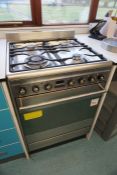 Smeg SUK61MS8 Stainless Steel Electric Oven with 4-Burner Gas Hob, Lot Located in Block: 5 Room: 6