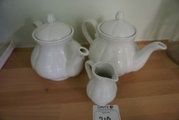 2no. White Ceramic Tea Pots with White Ceramic Milk Jug, Lot is Located Main Building, Room: