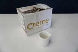 12no. Boxed and Unused Crème Monet 2oz Milk Jugs
